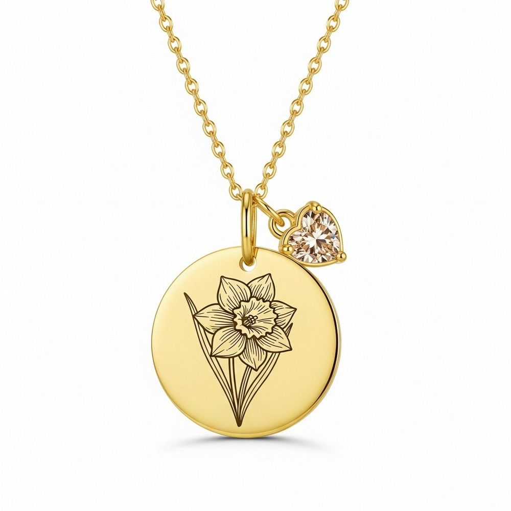 Elegant custom birth month flower birthstone charm necklace featuring a daffodil flower engraved gold pendant necklace and a gold daffodil flower charm with diamond heart detail