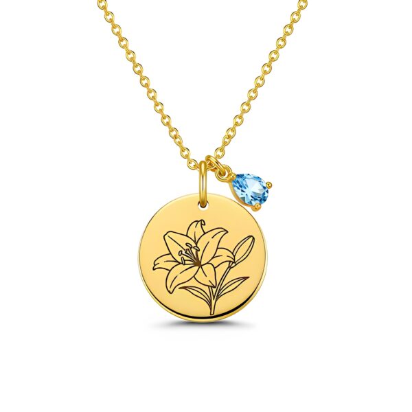 Elegant custom birth month flower birthstone charm necklace featuring a gold lily flower pendant with blue topaz charm – a personalized floral birthstone gold necklace for timeless beauty and meaning