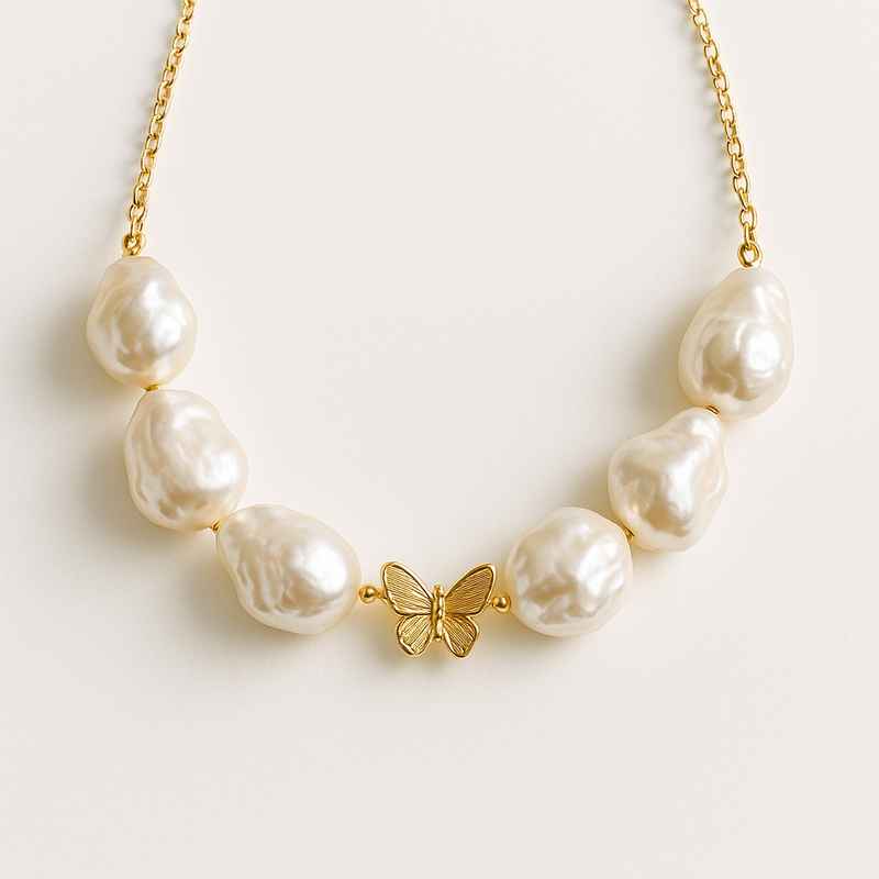 Sustainable Baroque Pearl Necklace with 14K Gold Plated Butterfly Accent 1 Sustainable Baroque Pearl Necklace with 14K Gold Plated Butterfly Accent