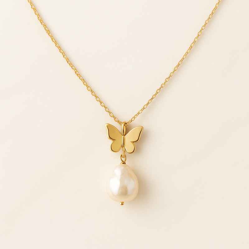 Sustainable Baroque Pearl Necklace with Butterfly Accent 14K Gold Necklace 1 Sustainable Baroque Pearl Necklace with Butterfly Accent 14K Gold Necklace