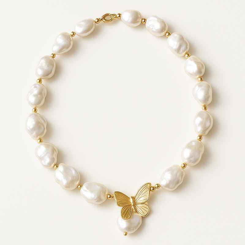 Sustainable Baroque Pearl Necklace with 14k Gold Plated Butterfly Accent 2 Sustainable Baroque Pearl Necklace with 14k Gold Plated Butterfly Accent