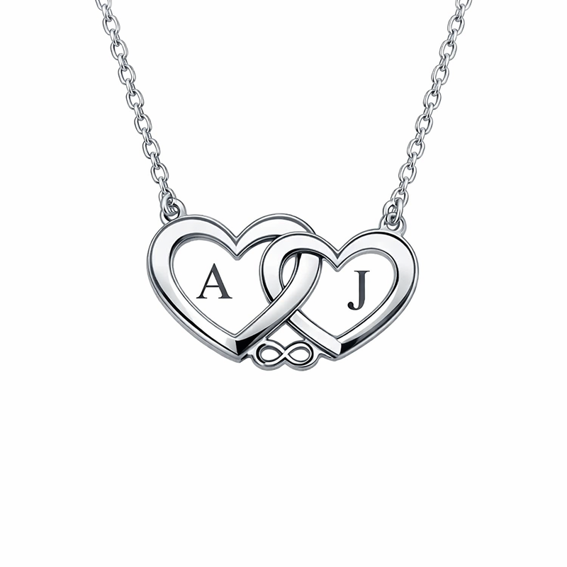 Elevating Your Jewelry Line with a Minimalist Stainless Steel Heart Pendant: The Power of Double Heart Initial Necklaces and Love Symbol Pendants for Women Elevating Your Jewelry Line with a Minimalist Stainless Steel Heart Pendant: The Power of Double Heart Initial Necklaces and Love Symbol Pendants for Women